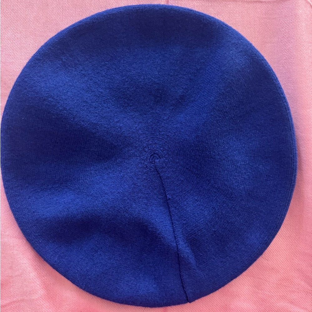 Stylish vivid Blue Beret. 100% Acrylic Hand wash cold only, and flat dry.